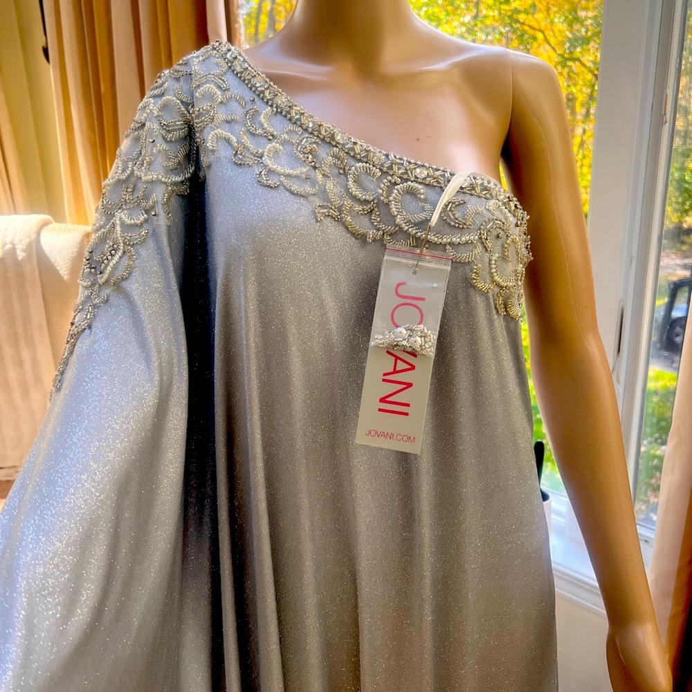 NWT Jovani one shoulder gown. Embellished w/ sequins and clear crystals. Size 8